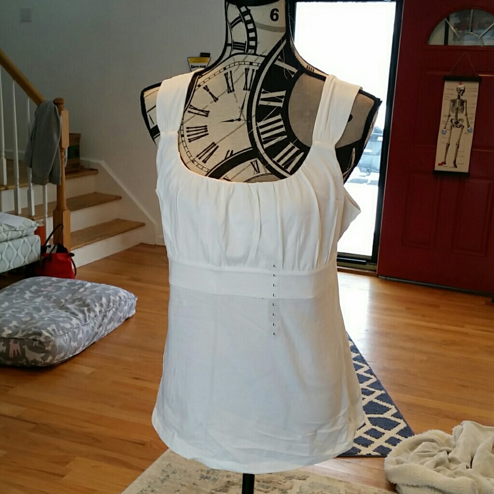 Bright white tank top.